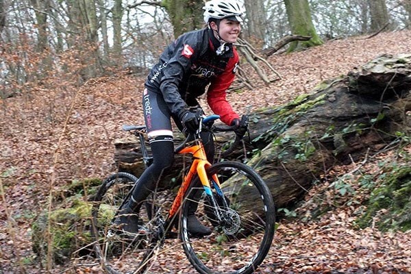 Team Rider Alex Thomas in a Giant cyclocross bike in a woodland setting